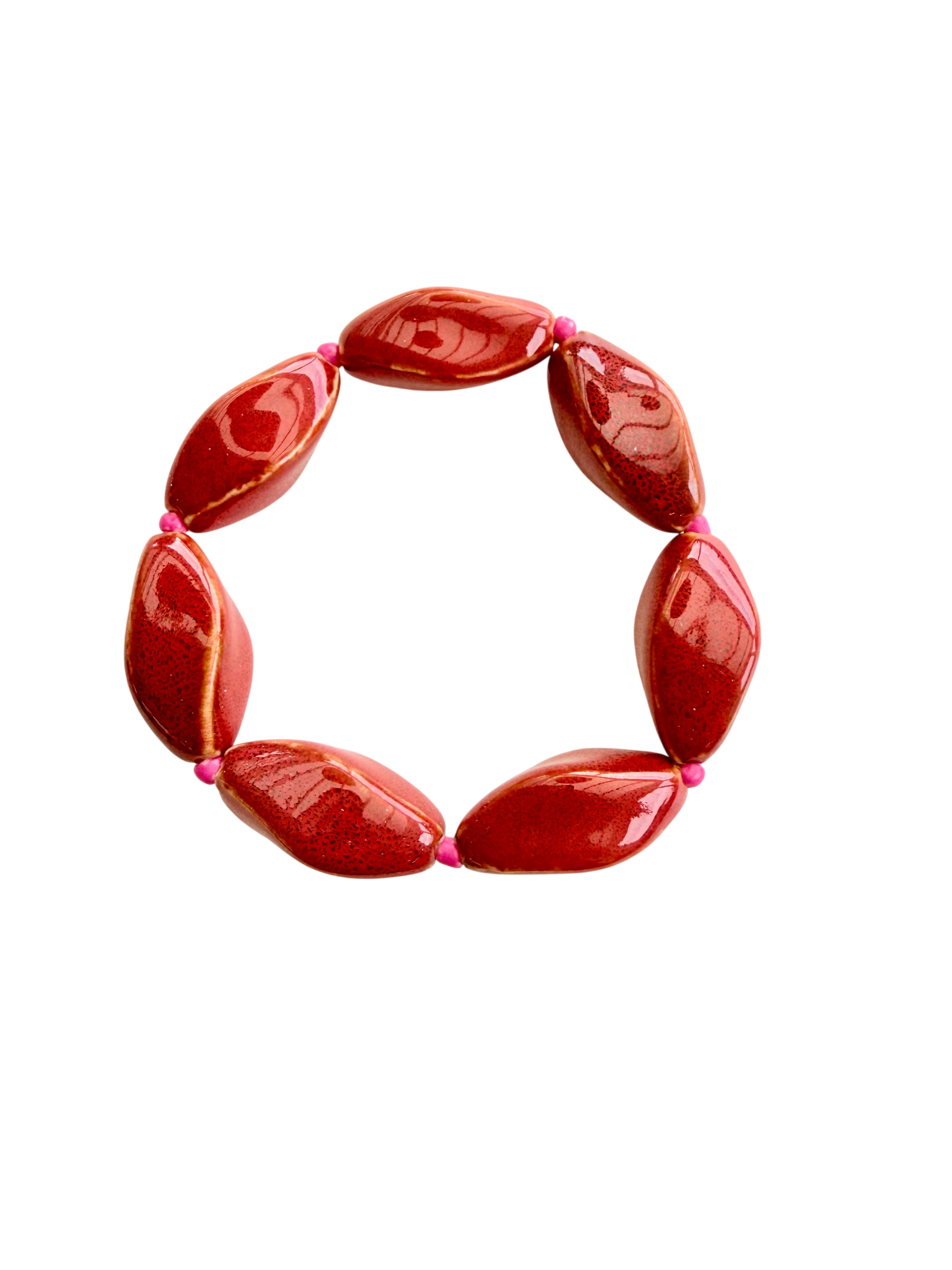 Armbånd med orange keramik perler og pink perler