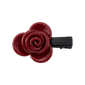 Hårklemme med bordeaux rose på hvid baggrund uden holder